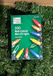 lot 167 image: Boxed 6.5 Foot Artificial Spruce Tree with Mini Tree Lights