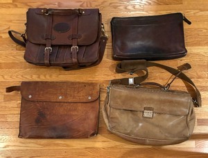 lot 213 image: Four Leather Briefcases and Pouches by Coach, Orvis and More