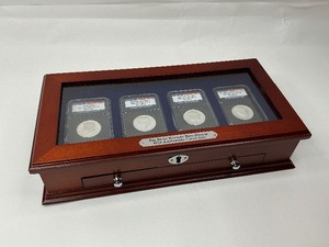 lot 5 image: The Silver Kennedy Half Dollar 50th Anniversary Collection in a Cherrywood Box