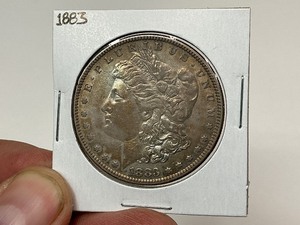 lot 19 image: 1883 Morgan Silver Dollar - Toned