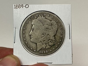 lot 20 image: 1889-O Morgan Silver Dollar