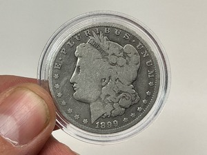 lot 29 image: 1899-O Morgan Silver Dollar