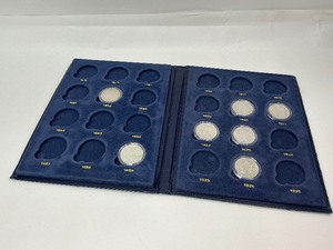 lot 36 image: 7pc Silver Dollar Collection