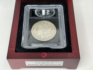 lot 37 image: 1899-O Micro O Morgan Silver Dollar in Cherrywood Box