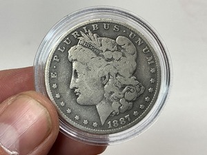 lot 49 image: 1887-O Morgan Silver Dollar