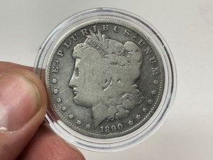 lot 54 image: 1890-O Morgan Silver Dollar