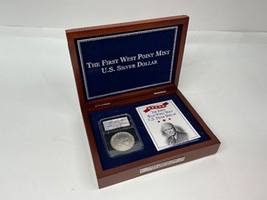lot 57 image: 1990 Eisenhower Centennial 90% Silver Commemorative Dollar in Cherrywood Box