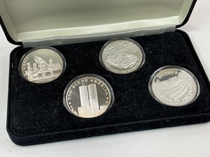 lot 68 image: 4pc 999. 1oz Silver 911 Tribute Coins