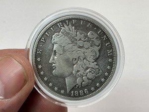 lot 98 image: 1886-S Morgan Silver Dollar
