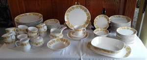 lot 716 image: Noritake Progression China Sunny Side. Setting for 12, plus serving pieces.