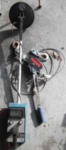 lot 77 image: Metal Detector And Come-A-Long.