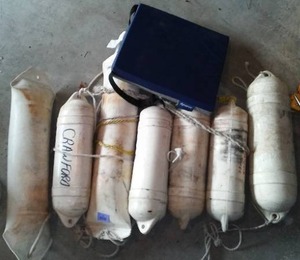 lot 86 image: Buoys (7) Includes Covered Tote And Like New Cushion