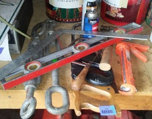 lot 110 image: Misc. Hand Tools. Square, Level, Saws, Hammer Caulk Gun And More.