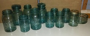 lot 128 image: Collection of 12 Vintage Blue Glass Canning Jars - Ball and Atlas