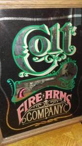 lot 166 image: Framed Vintage Colt Firearms Company Sign