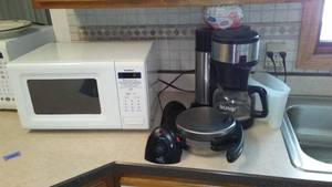 lot 229 image: Kitchen Appliances Lot GoldStar Microwave, Presto Flipside Waffle Maker, BUNN Coffee Maker
