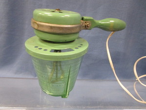 lot 87 image: Green Vaseline Measuring Cup, Green Enamel Mixer