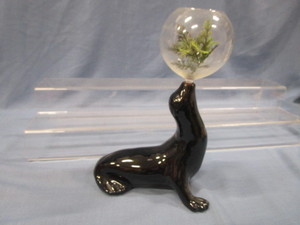 lot 106 image: Ceramic Seal & Bowl