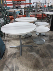 lot 454 image: HERMAN MILLER AND OTHER BRAND ROUND WHITE LAMINATE TABLES