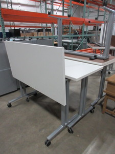 lot 462 image: HERMAN MILLER FLIP TOP WORK TABLES