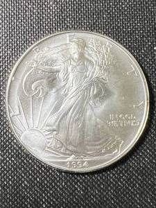 lot 03 image: 1994 AMERICAN SILVER EAGLE 1 TROY OZ .999 FINE SILVER