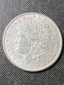 lot 04 image: 1889 US MORGAN SILVER DOLLAR