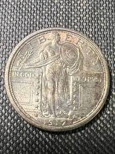lot 21 image: 1917 (type 1 exposed breast) US STANDING LIBERTY QUARTER UNC