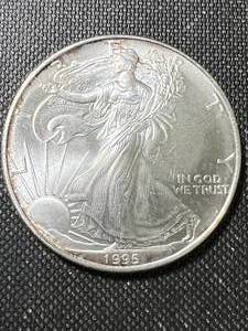 lot 25 image: 1995 AMERICAN SILVER EAGLE 1 TROY OZ .999 FINE SILVER