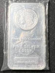 lot 26 image: 5 TROY OZ .999 FINE SILVER MORGAN DOLLAR DESIGNED BAR