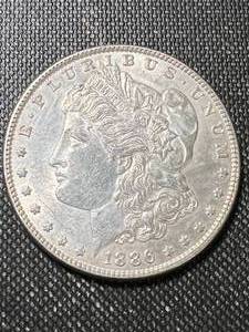 lot 36 image: 1886 US MORGAN SILVER DOLLAR