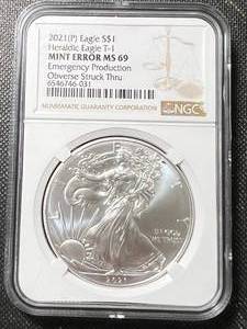 lot 12A image: 2021 AMERICAN SILVER EAGLE NGC MINT ERROR MS69