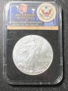 lot 16A image: 2024 AMERICAN SILVER EAGLE IN DONALD TRUMP SLAB