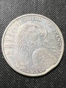 lot 49A image: 1 TROY OZ .999 FINE SILVER UNITED WE STAND ROUND