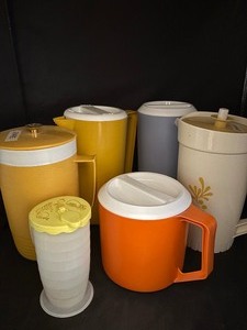 lot 44 image: Vintage Tupperware Pitchers and more