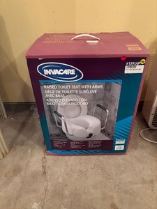 lot 180 image: Raised Toilet Seat with Arms