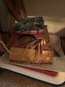 lot 111 image: Christmas Decorations, Wooden Sled with Lights