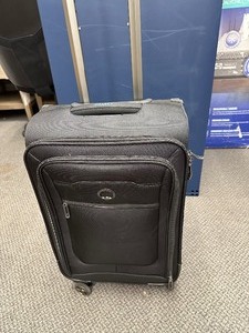 lot 69 image: Delsey Paris Medium  Large Expandable Spinner Luggage - Like New