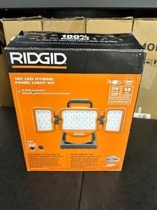 lot 43 image: Rigid 18V Cordless Hybrid LED Panel Light Kit with 4.0 Ah Battery and 18V Charger Retail $199.00