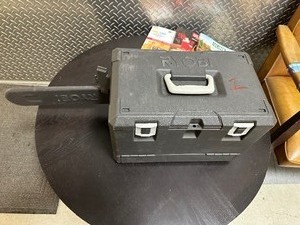 lot 105 image: Ryobi 16 in. 37cc 2-Cycle Gas Chainsaw with Heavy-Duty Case Model RY3716 - Case Marked # 1