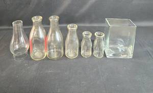 lot 21 image: Set of 6 Vintage Glass Bottles and Cube Vase