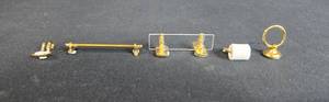 lot 44 image: Collection of Miniature Gold Tone Display Accessories - Reutter Porzellan
