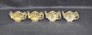 lot 60 image: Set of 4 Vintage Childs Tea Set Containers - Unique Teapot Design