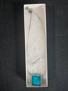 lot 82 image: Reversible Origin Jewelry Pendant Necklace with Turquoise and Black Design