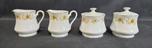 lot 134 image: Set of 4 Vintage Cotillion Creamers and Sugar Bowls by International China