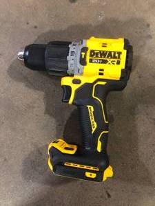 lot 7 image: DEWALT 20V Compact Cordless 12 in. Hammer Drill (Tool Only)  Customer Returns See Pictures