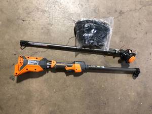 lot 23 image: RIDGID 18V Brushless 14 in. Cordless String Trimmer  Customer Returns See Pictures