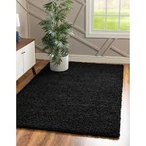 lot 21 image: Unique Loom Solid Shag Jet Black 4 ft. x 6 ft. Area Rug   Customer Returns See Pictures