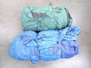 Pair of Tarps Good for woodpile may have holes or rips