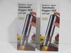 lot 36 image: 2 Brand New Sharper Image Automatic Pepper Mills wLights