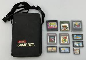 lot 122 image: Vintage Nintendo Game Boy Holder With Misc. Games